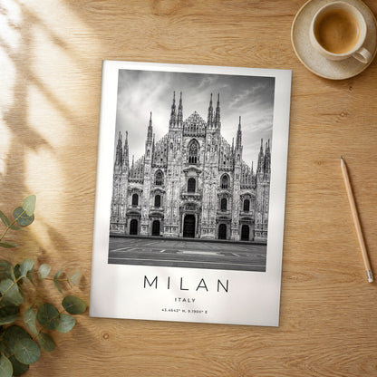 Unframed Milan black and white travel poster on a wooden table