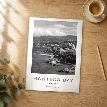 Unframed Montego Bay black and white travel poster on a wooden table