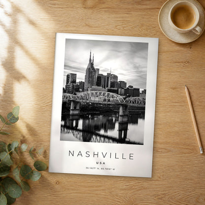 Unframed Nashville black and white travel poster on a wooden table