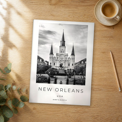 Unframed New Orleans black and white travel poster on a wooden table