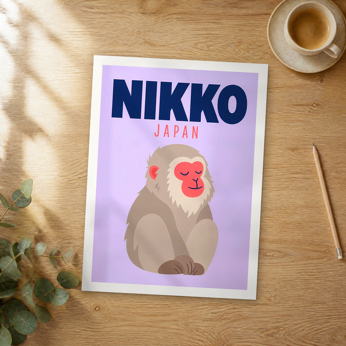 Unframed Nikko pop art travel poster on a wooden table