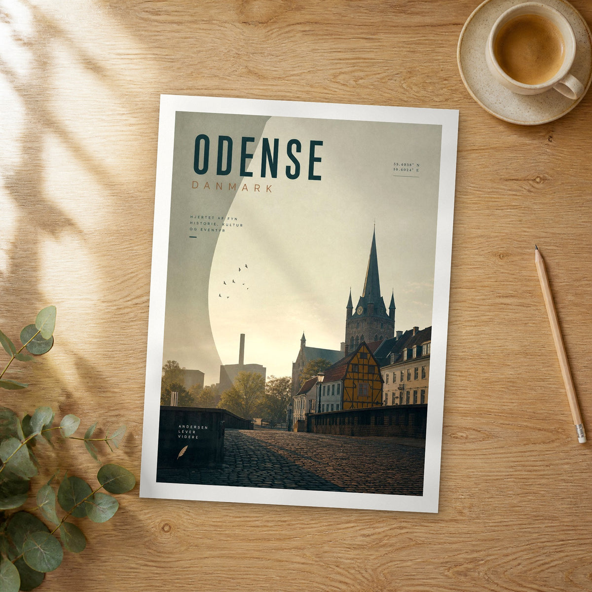 Unframed Odense bold typography travel poster on a wooden table
