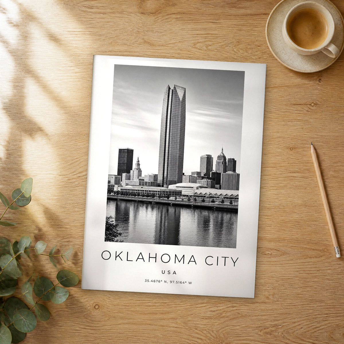 Unframed Oklahoma City black and white travel poster on a wooden table