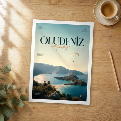 Unframed Oludeniz bold typography travel poster on a wooden table
