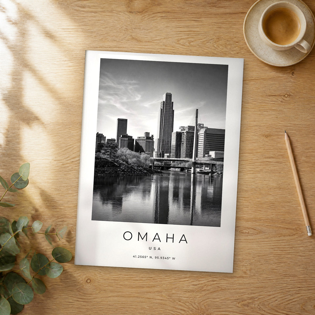 Unframed Omaha black and white travel poster on a wooden table
