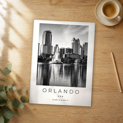 Unframed Orlando black and white travel poster on a wooden table