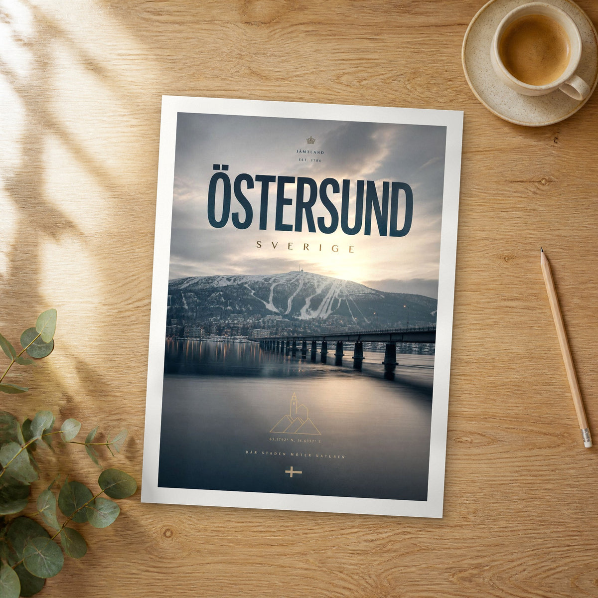 Unframed Östersund bold typography travel poster on a wooden table