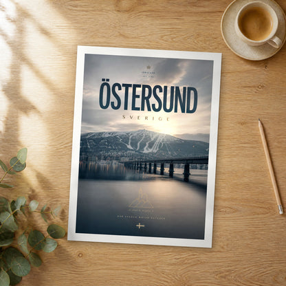 Unframed Östersund bold typography travel poster on a wooden table