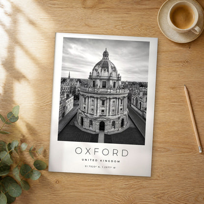 Unframed Oxford black and white travel poster on a wooden table