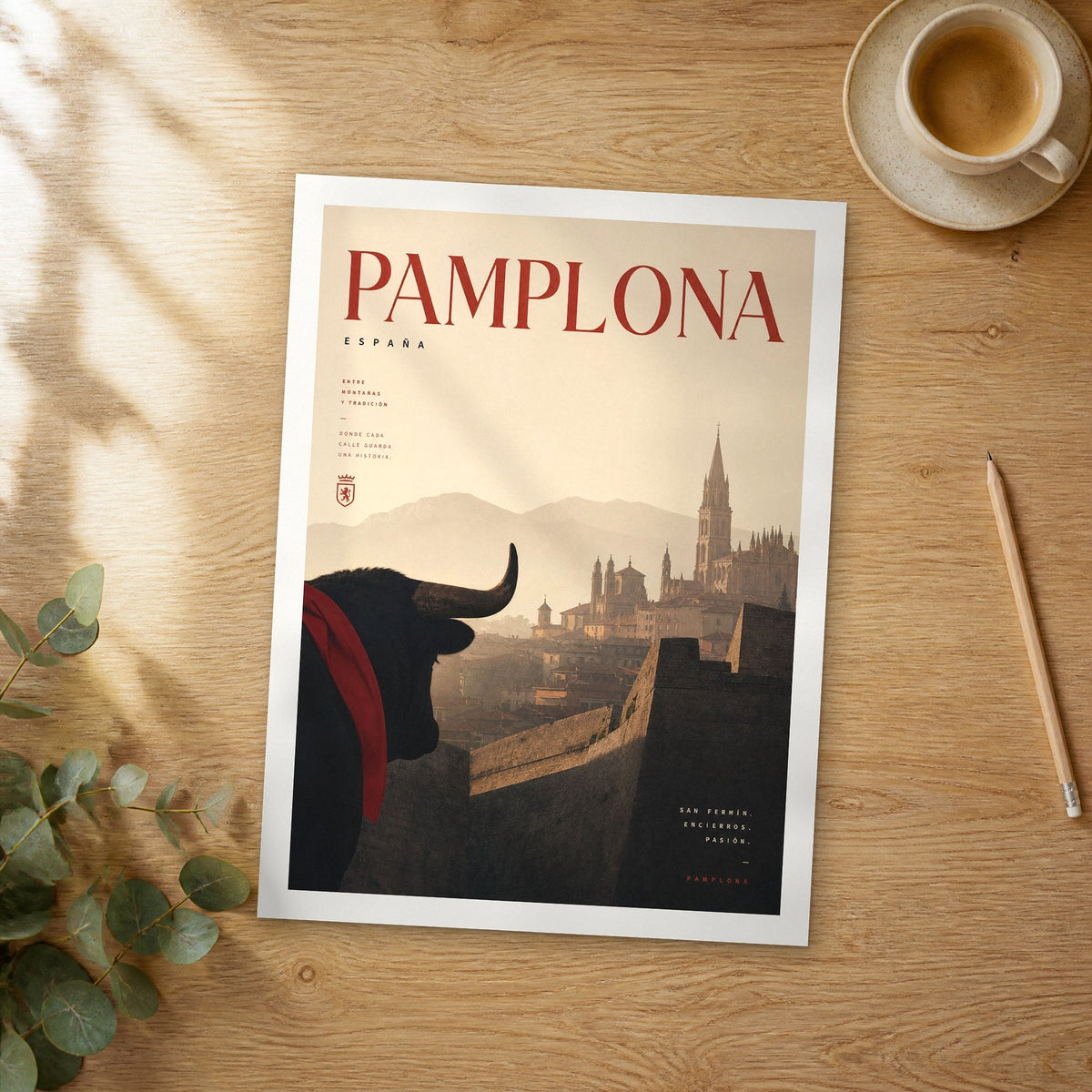 Unframed Pamplona bold typography travel poster on a wooden table