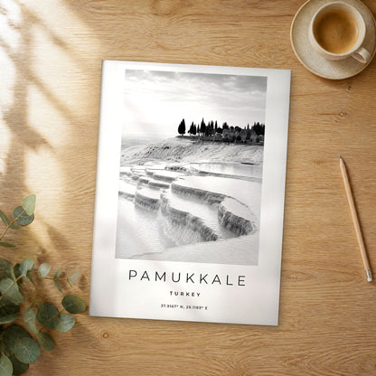 Unframed Pamukkale black and white travel poster on a wooden table