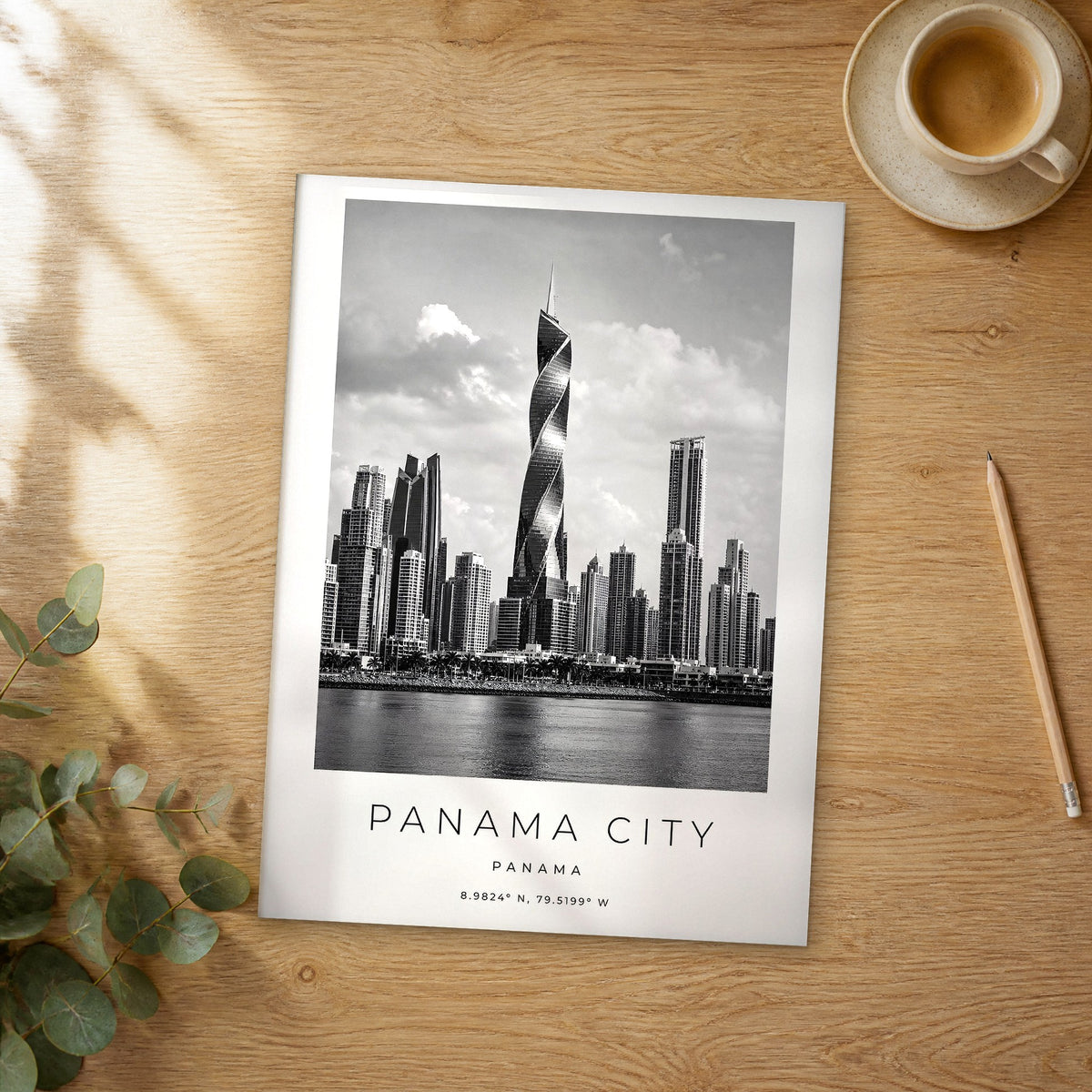 Unframed Panama City black and white travel poster on a wooden table