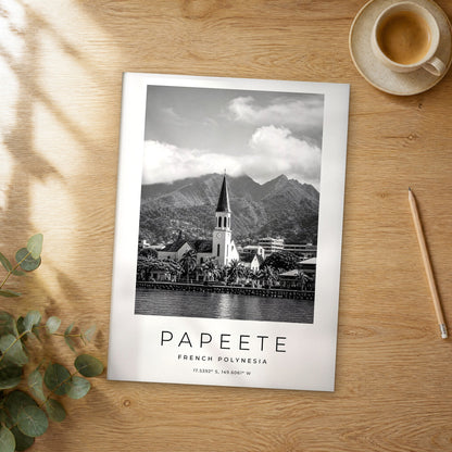 Unframed Papeete black and white travel poster on a wooden table
