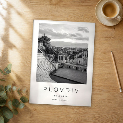 Unframed Plovdiv black and white travel poster on a wooden table