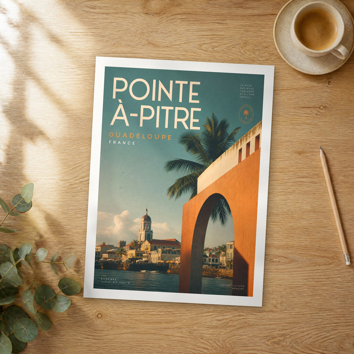 Unframed Pointe-à-Pitre bold typography travel poster on a wooden table