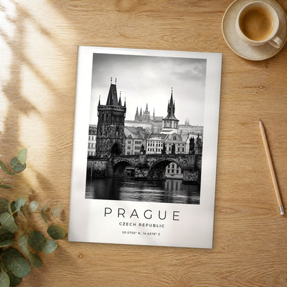 Unframed Prague black and white travel poster on a wooden table
