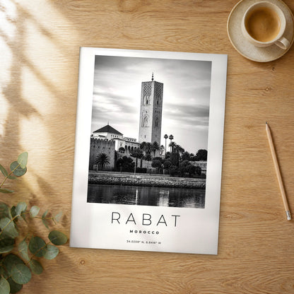 Unframed Rabat black and white travel poster on a wooden table
