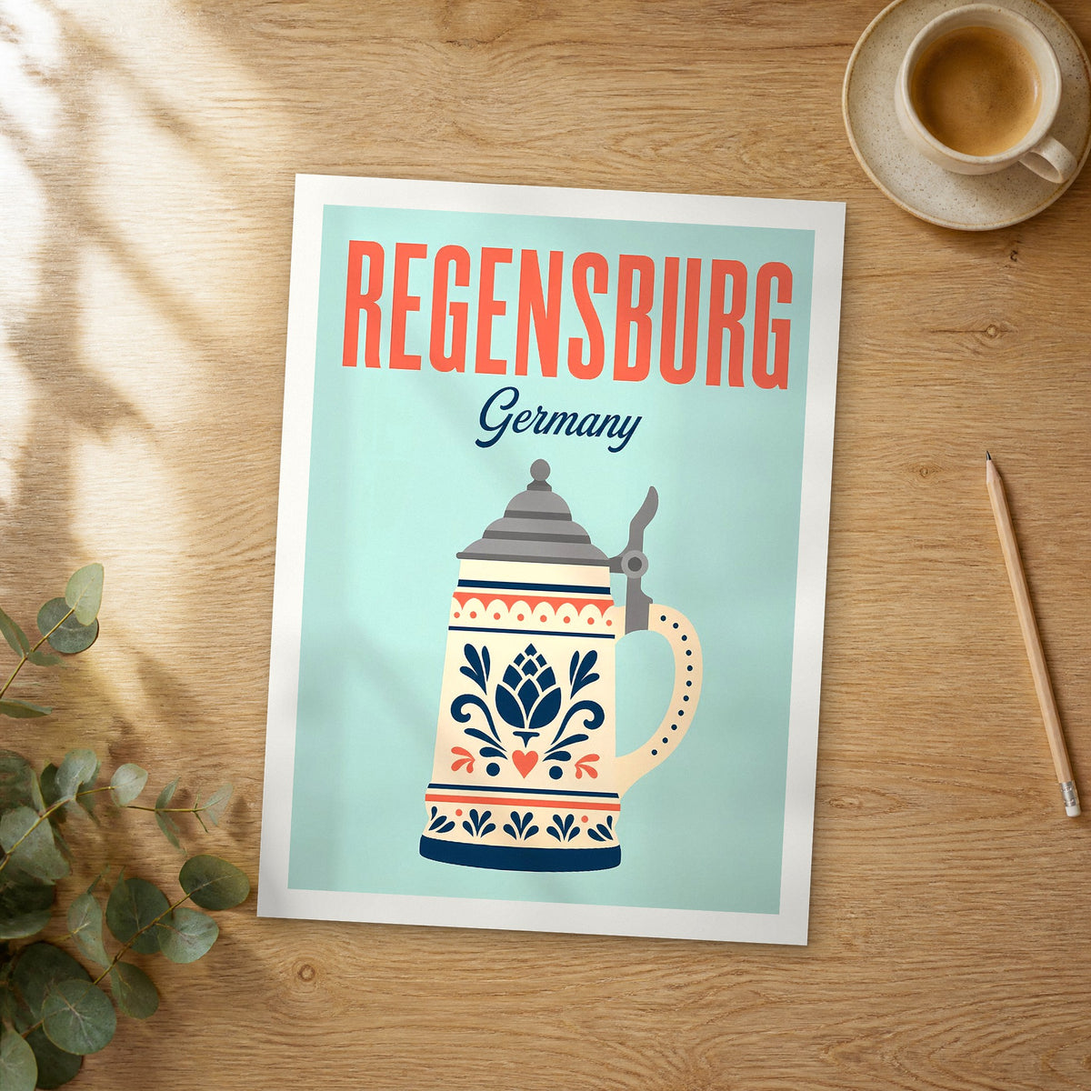 Unframed Regensburg pop art travel poster on a wooden table