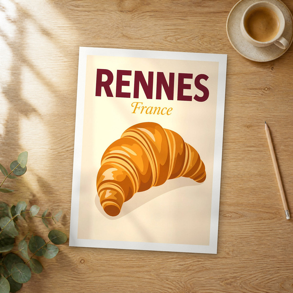 Unframed Rennes pop art travel poster on a wooden table