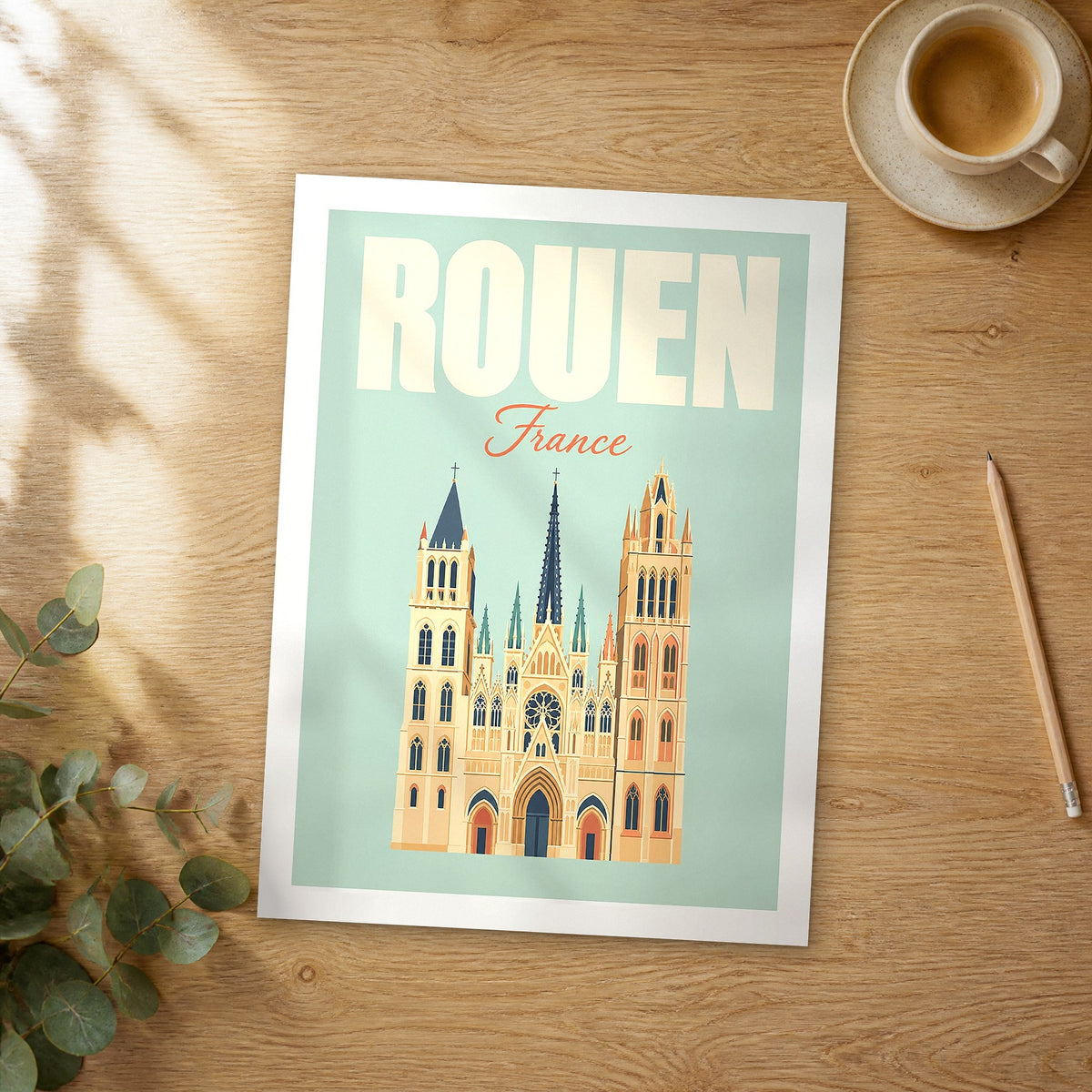 Unframed Rouen pastel pop art travel poster on a wooden table