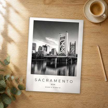 Unframed Sacramento black and white travel poster on a wooden table