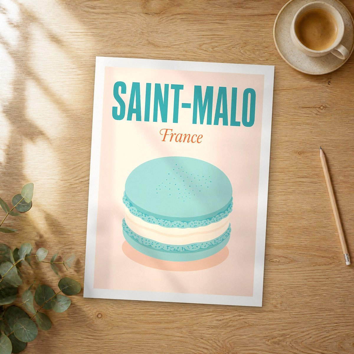 Unframed Saint-Malo pop art travel poster on a wooden table
