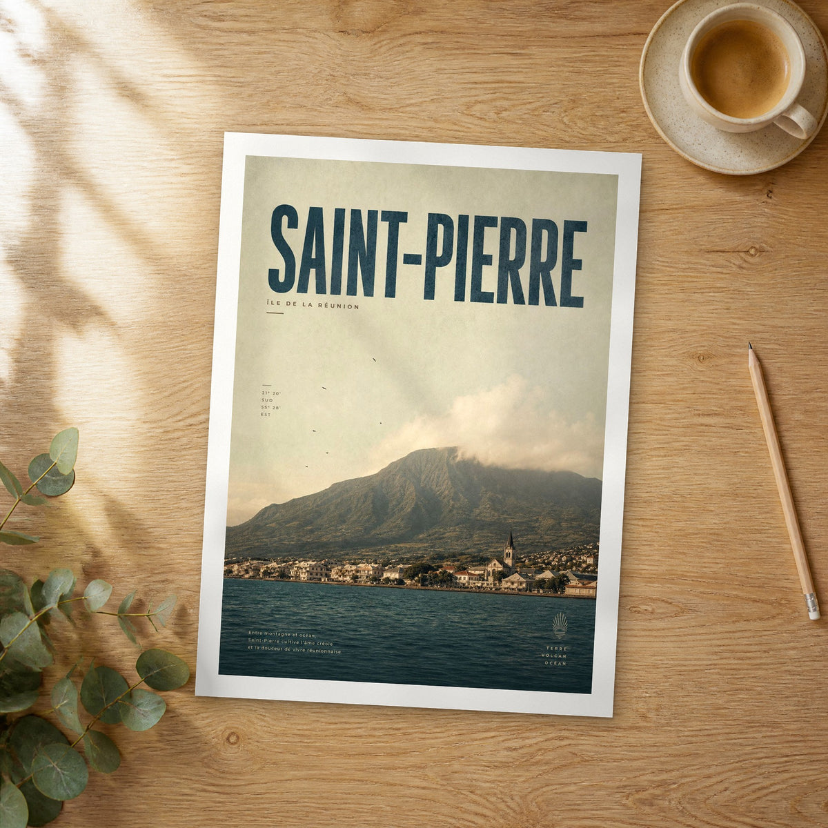 Unframed Saint-Pierre bold typography travel poster on a wooden table