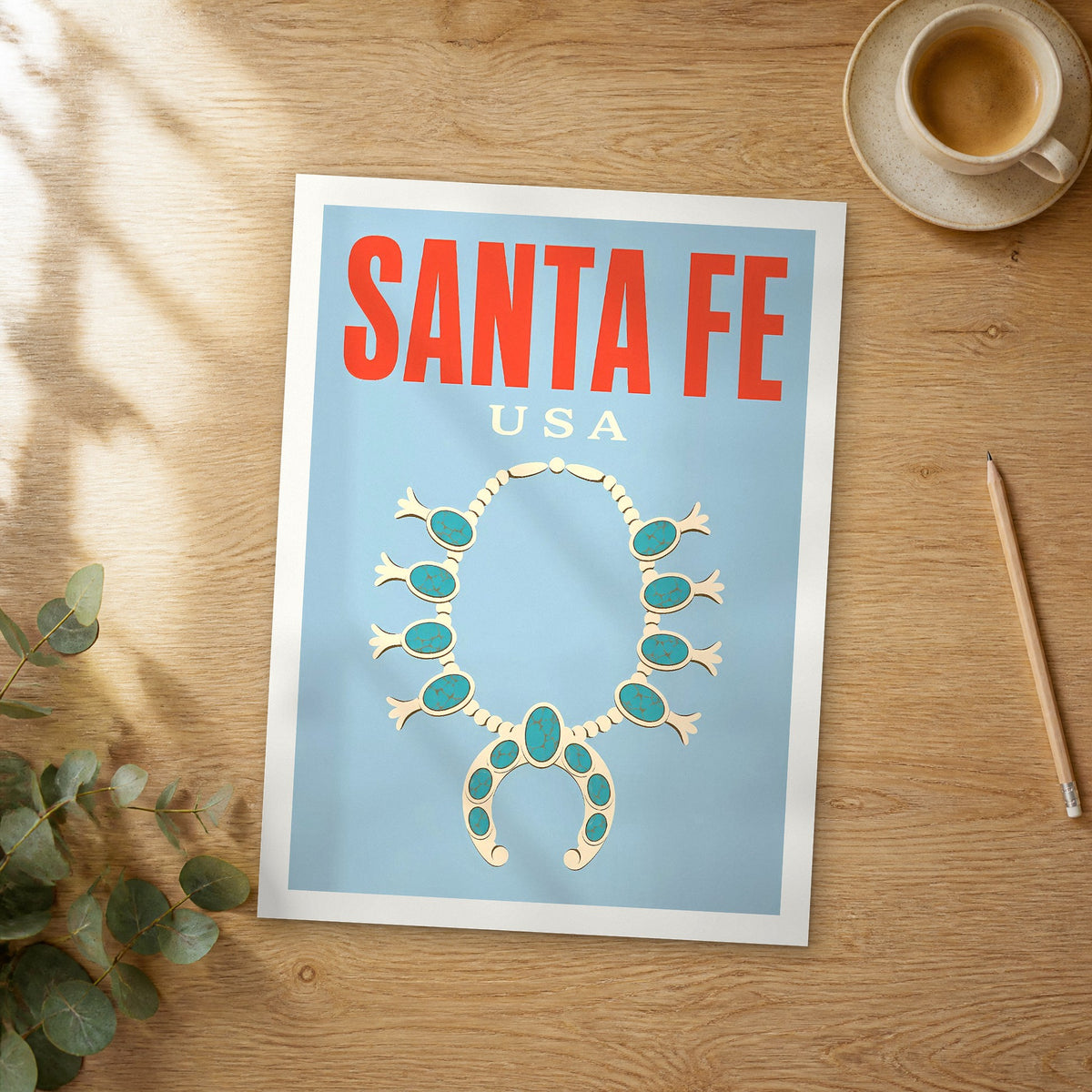 Unframed Santa Fe pop art travel poster on a wooden table