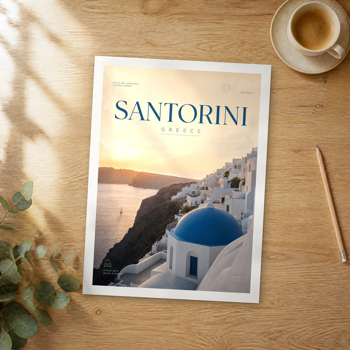 Unframed Santorini Blue Dome at Sunset bold typography travel poster on a wooden table
