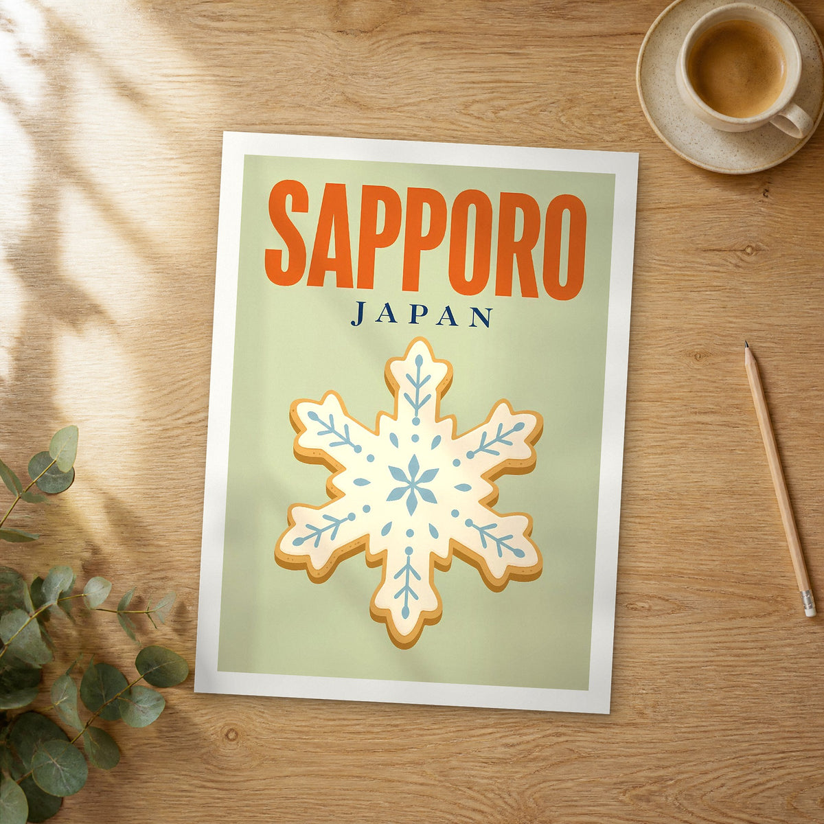 Unframed Sapporo pop art travel poster on a wooden table