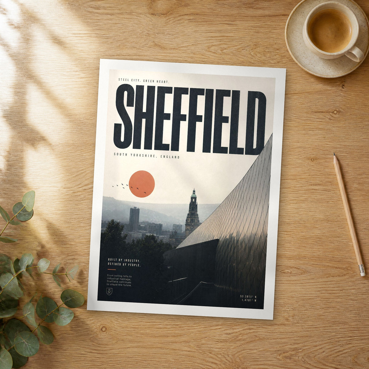 Unframed Sheffield bold typography travel poster on a wooden table