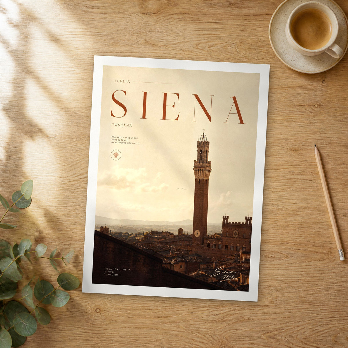 Unframed Siena Torre del Mangia bold typography travel poster on a wooden table