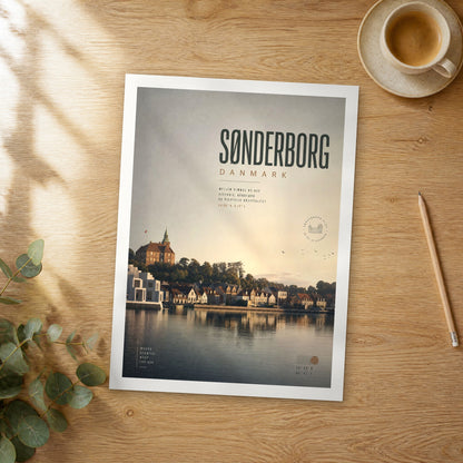 Unframed Sønderborg bold typography travel poster on a wooden table