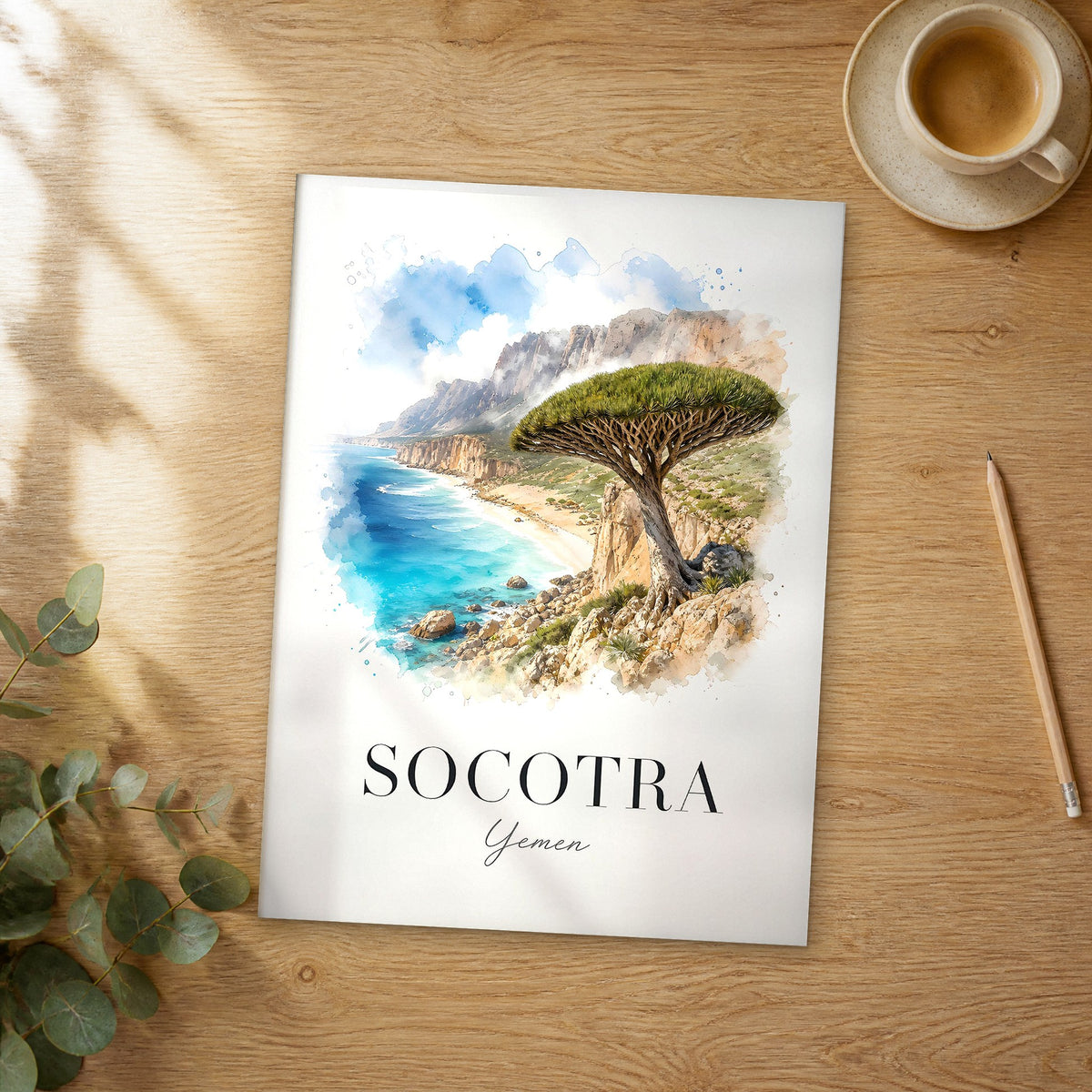 Unframed Socotra Dragon Tree Cliffs watercolor travel poster on a wooden table