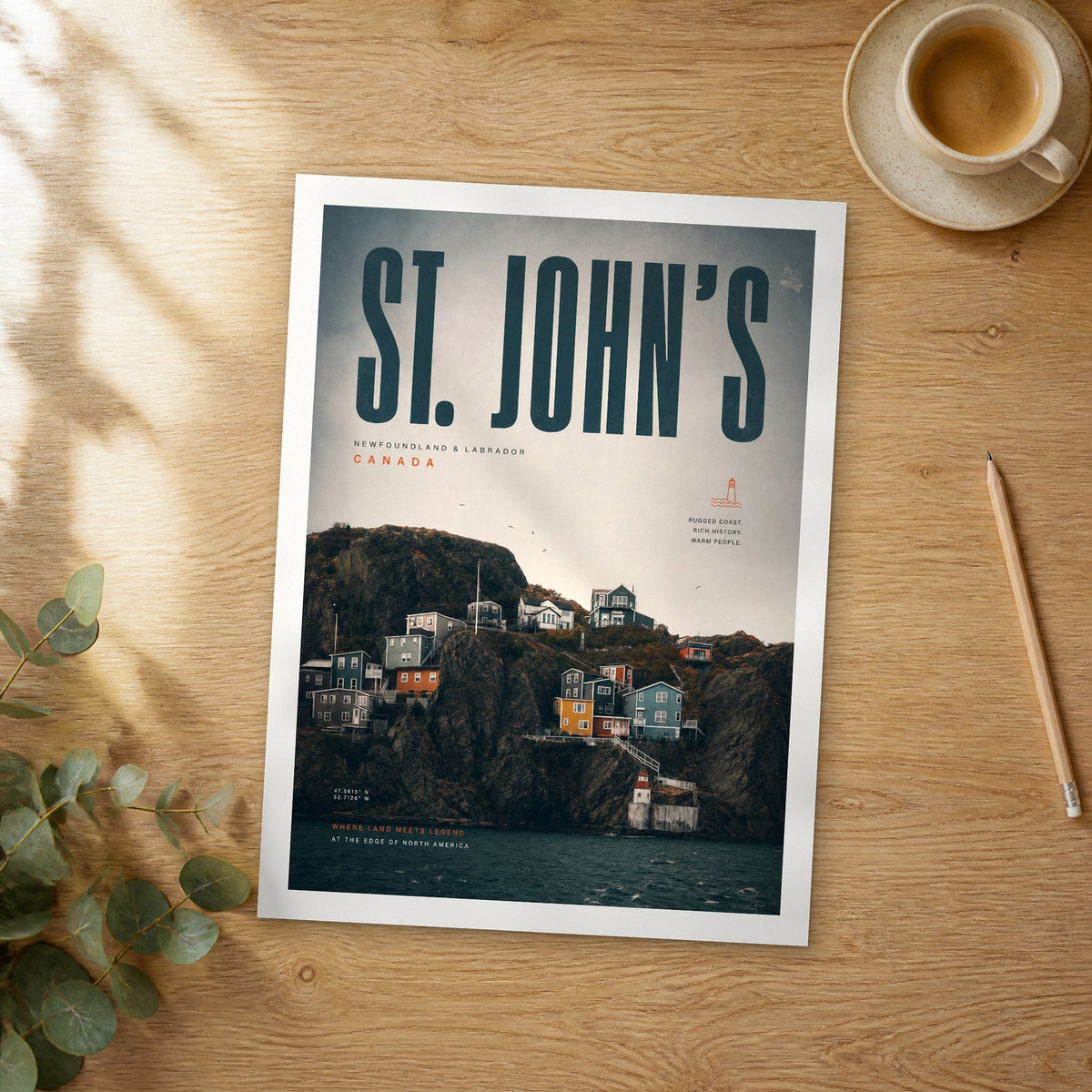Unframed St. John's bold typography travel poster on a wooden table