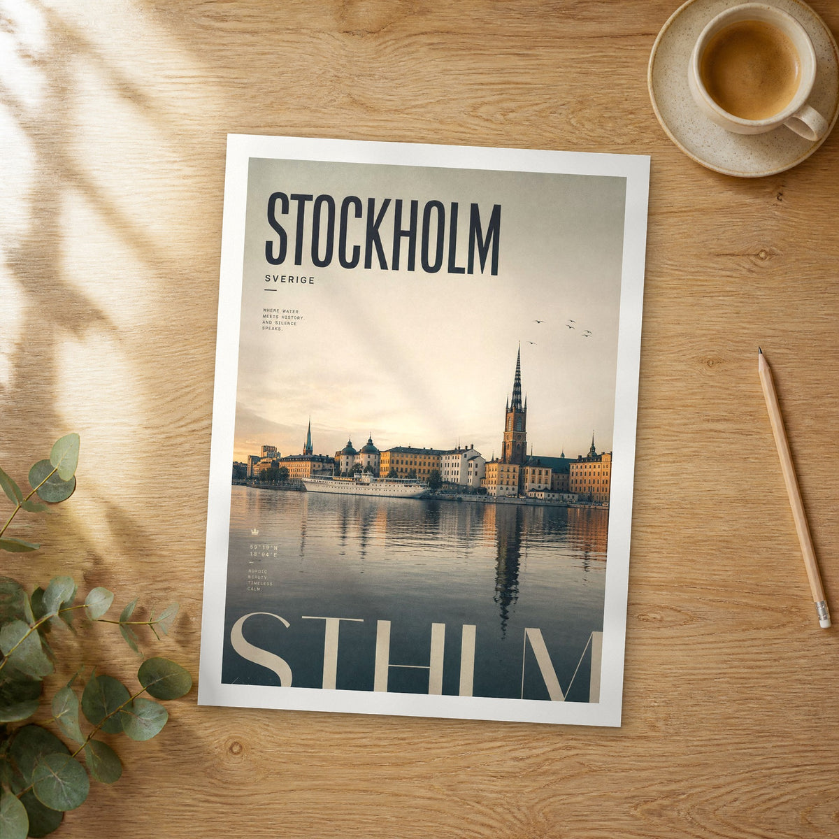 Unframed Stockholm bold typography travel poster on a wooden table