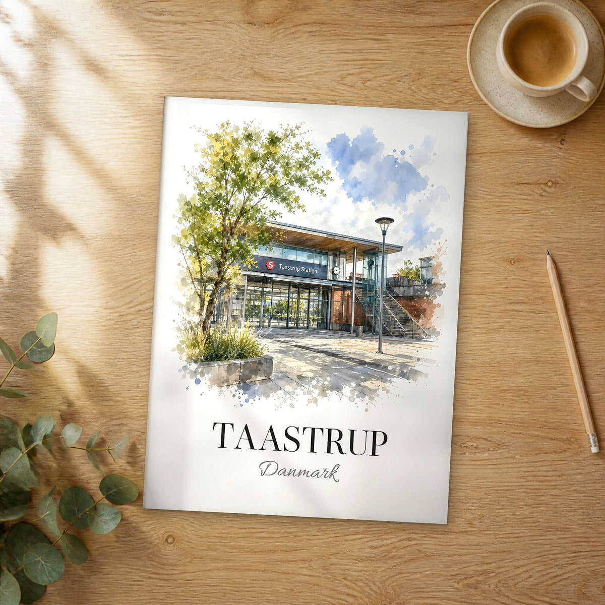 Unframed Taastrup watercolor travel poster on a wooden table