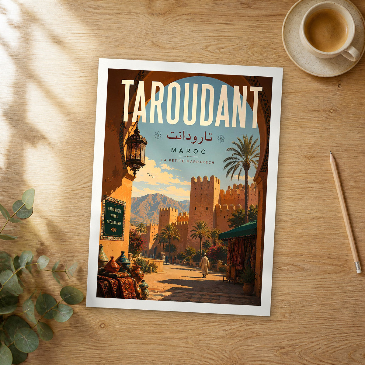 Unframed Taroudant retro travel poster on a wooden table