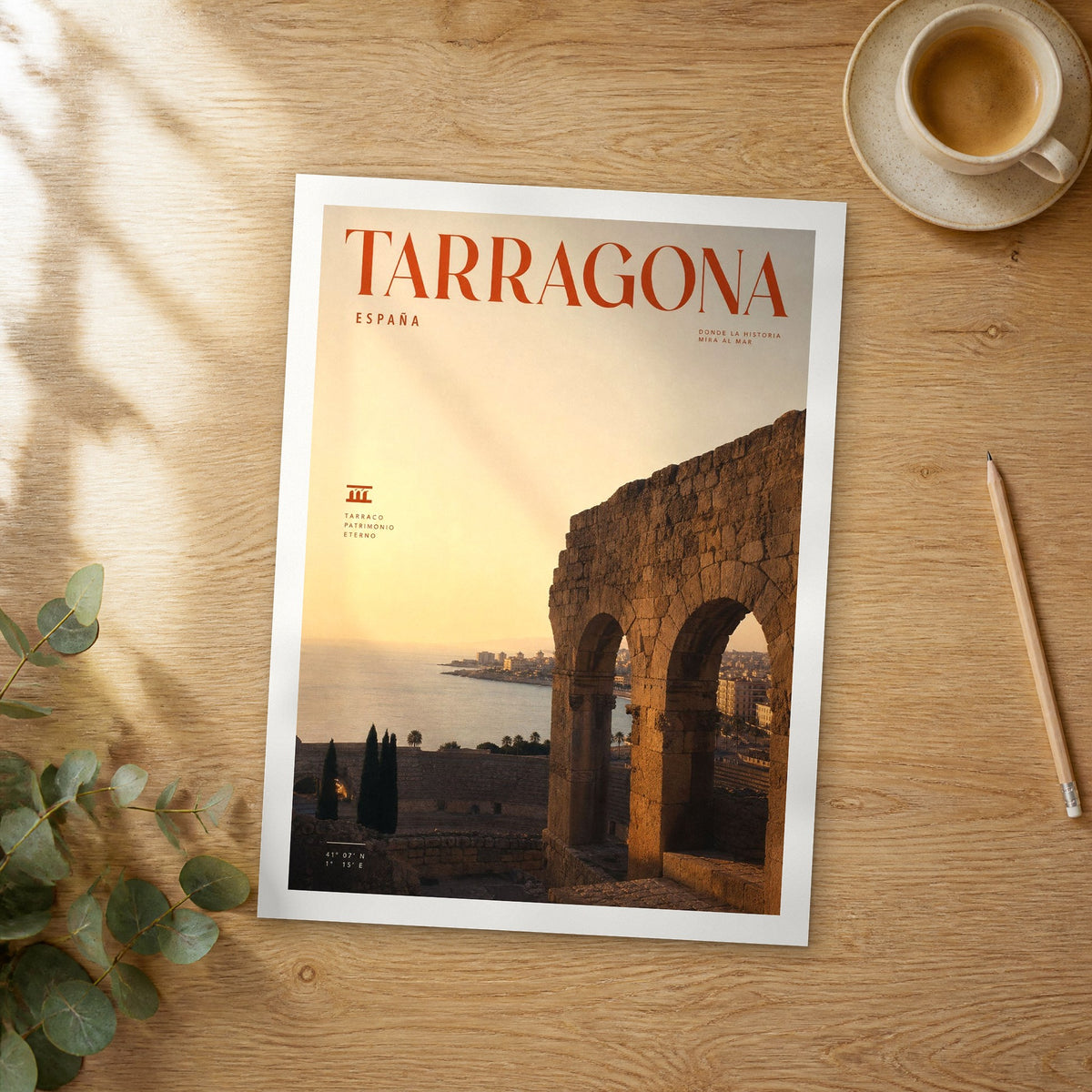 Unframed Tarragona bold typography travel poster on a wooden table