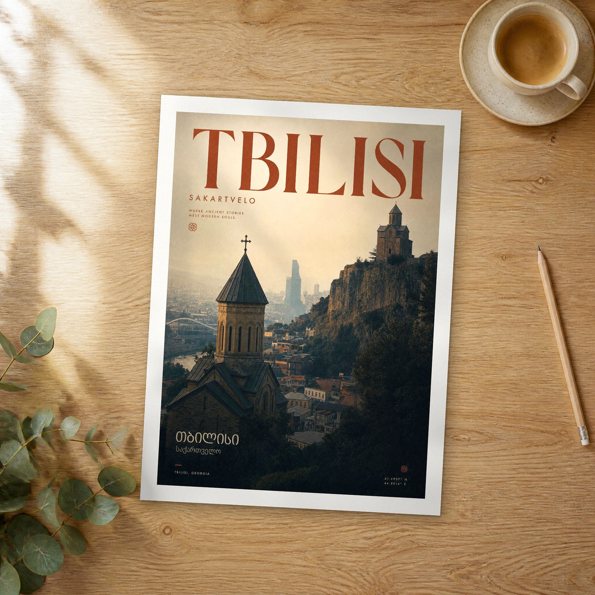 Unframed Tbilisi Old Town Churches bold typography travel poster on a wooden table