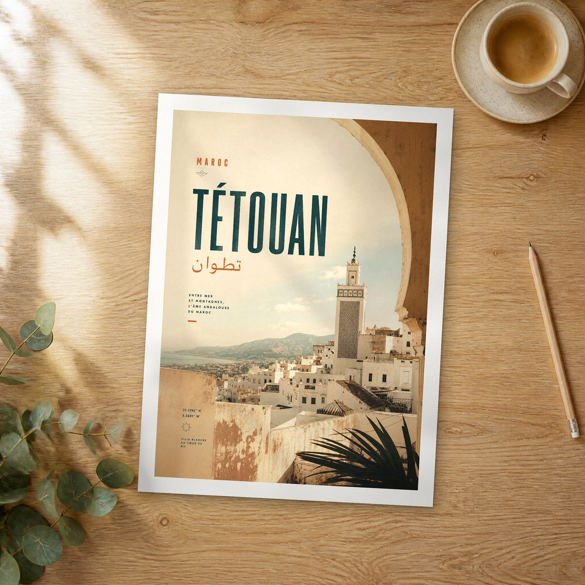 Unframed Tétouan bold typography travel poster on a wooden table