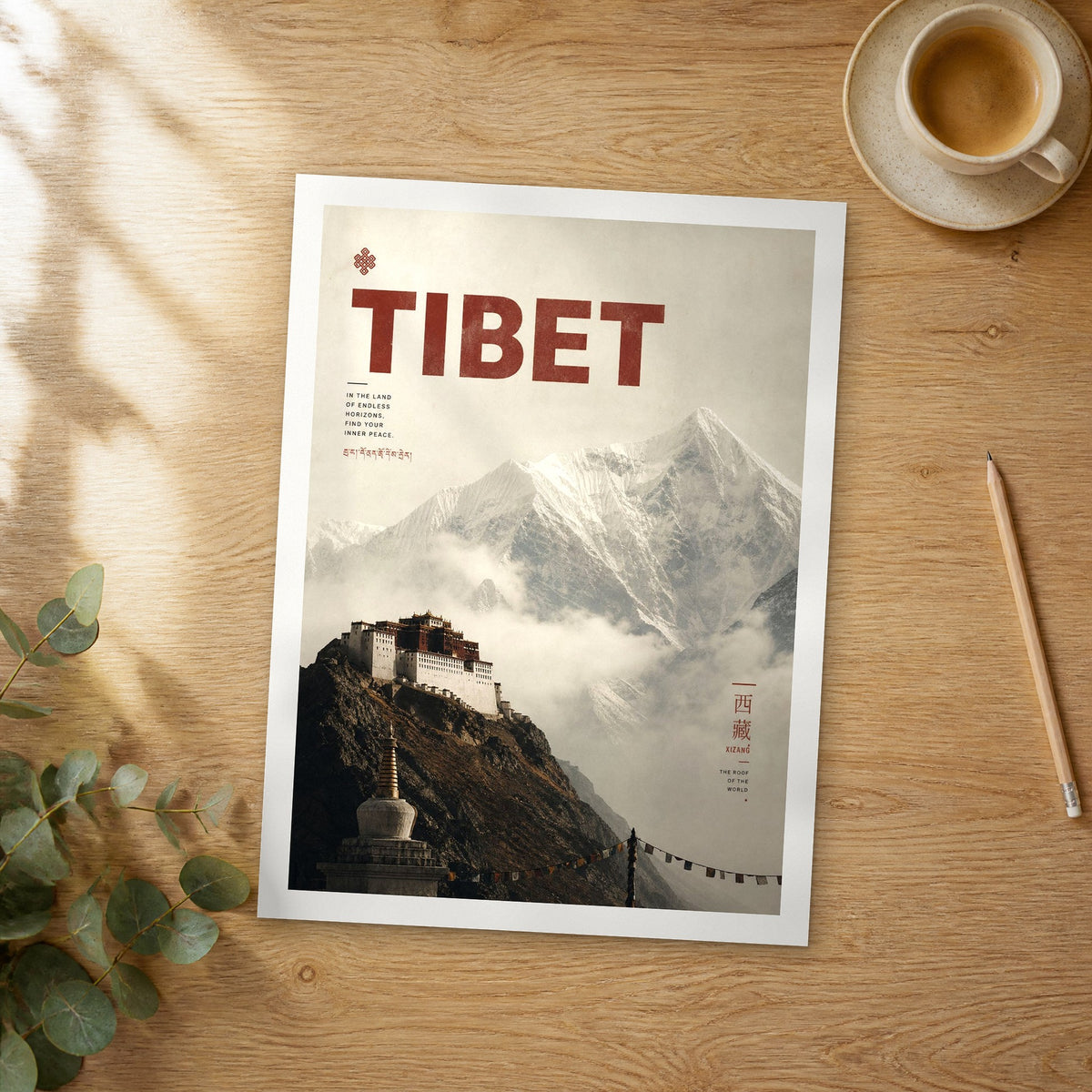 Unframed Tibet Mountain Monastery bold typography travel poster on a wooden table