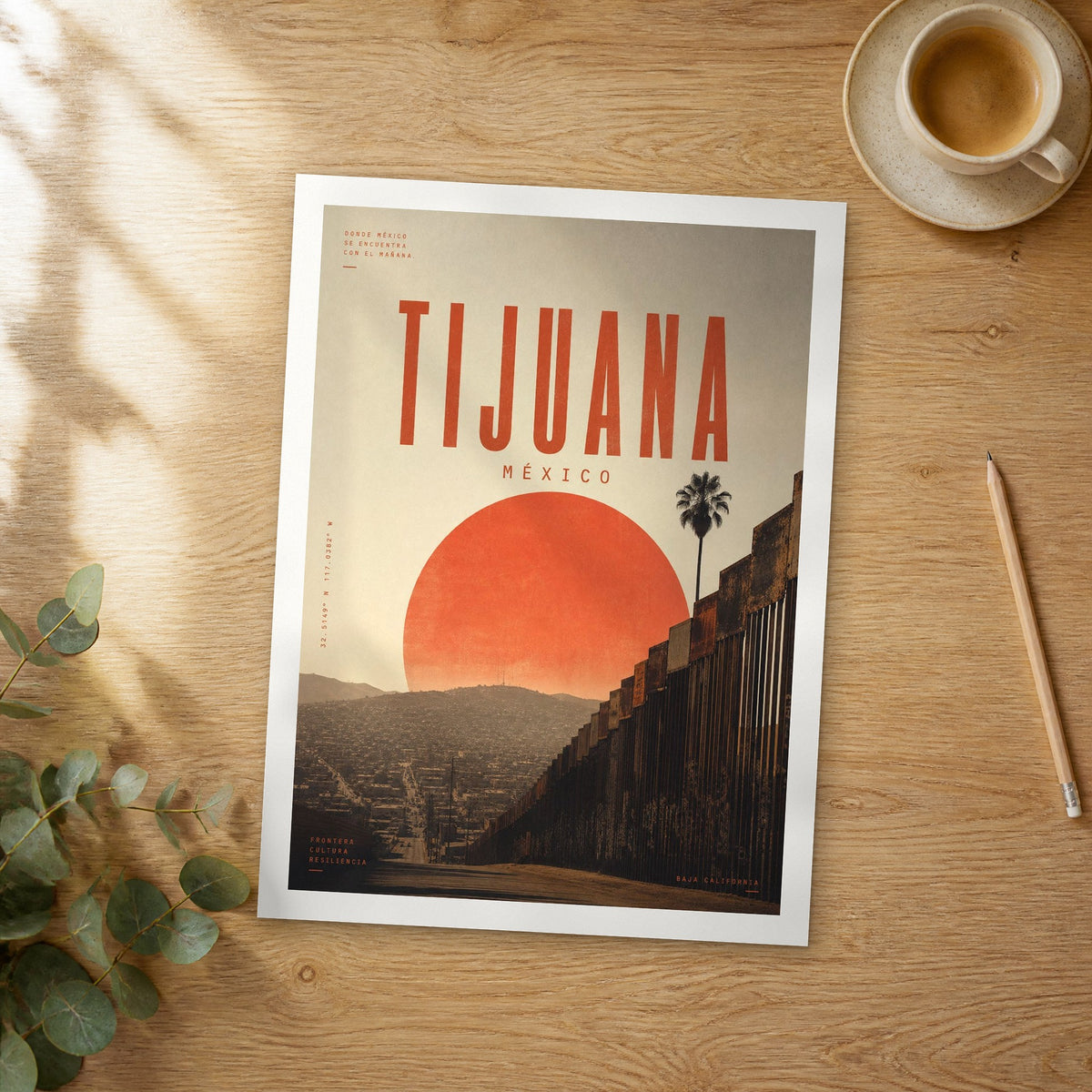 Unframed Tijuana bold typography travel poster on a wooden table