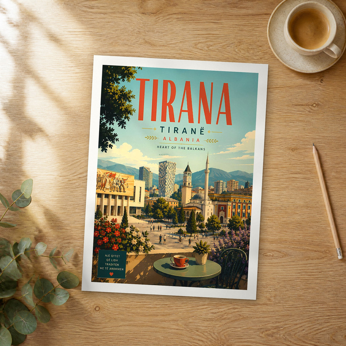 Unframed Tirana retro travel poster on a wooden table