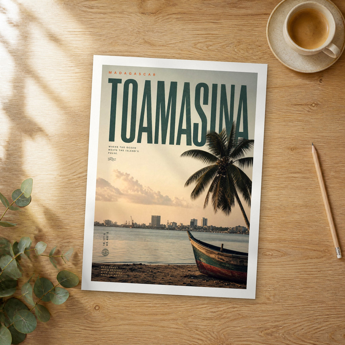 Unframed Toamasina bold typography travel poster on a wooden table
