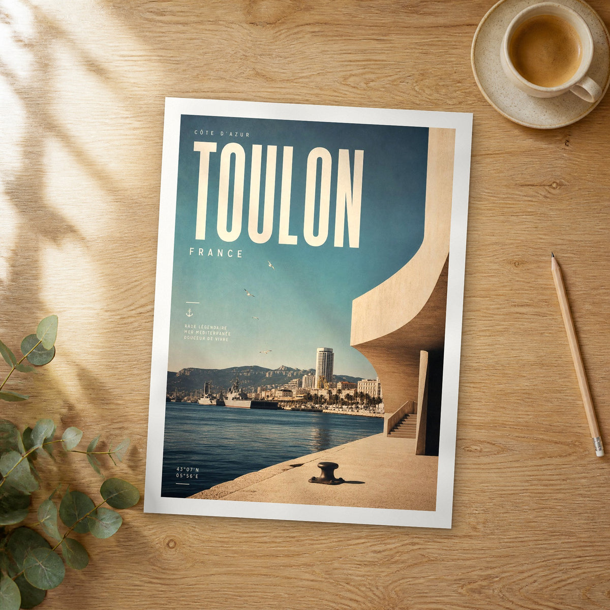 Unframed Toulon bold typography travel poster on a wooden table