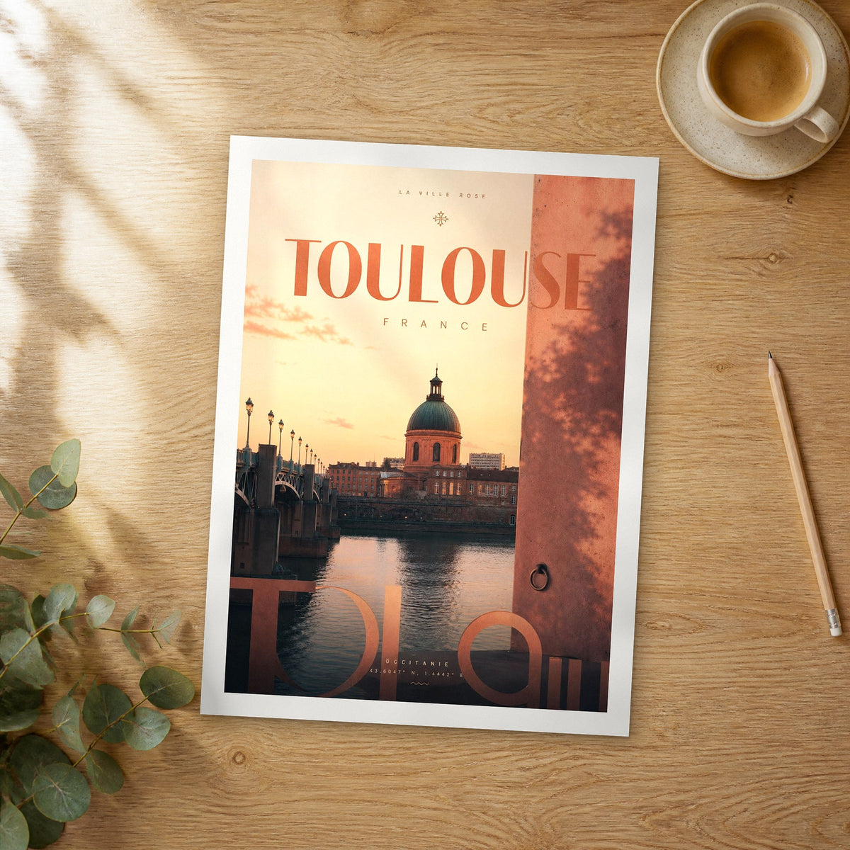 Unframed Toulouse bold typography travel poster on a wooden table