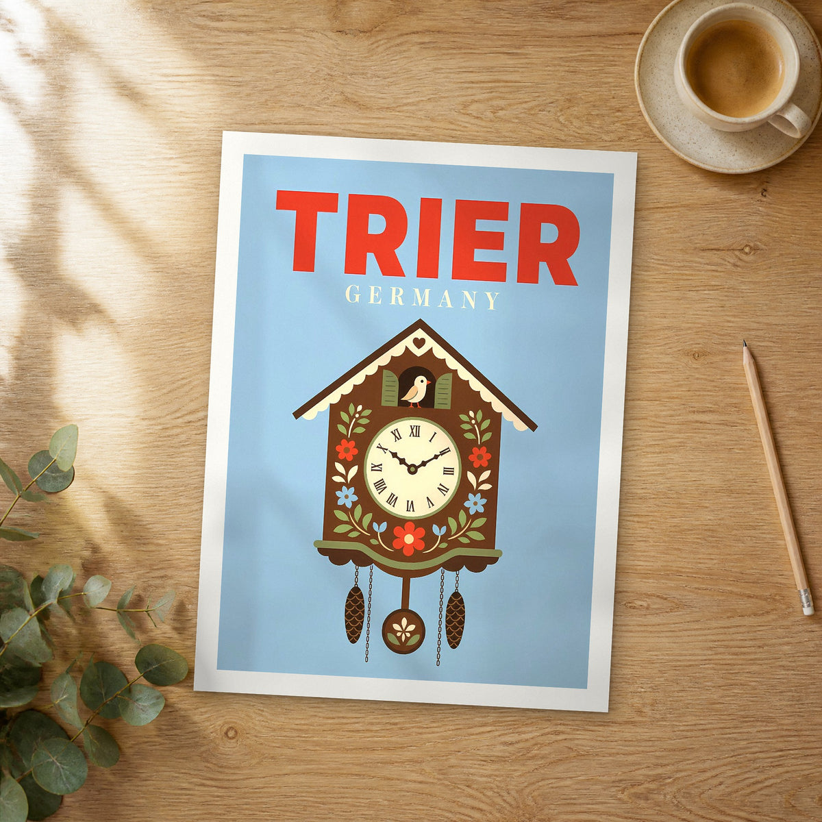 Unframed Trier pop art travel poster on a wooden table