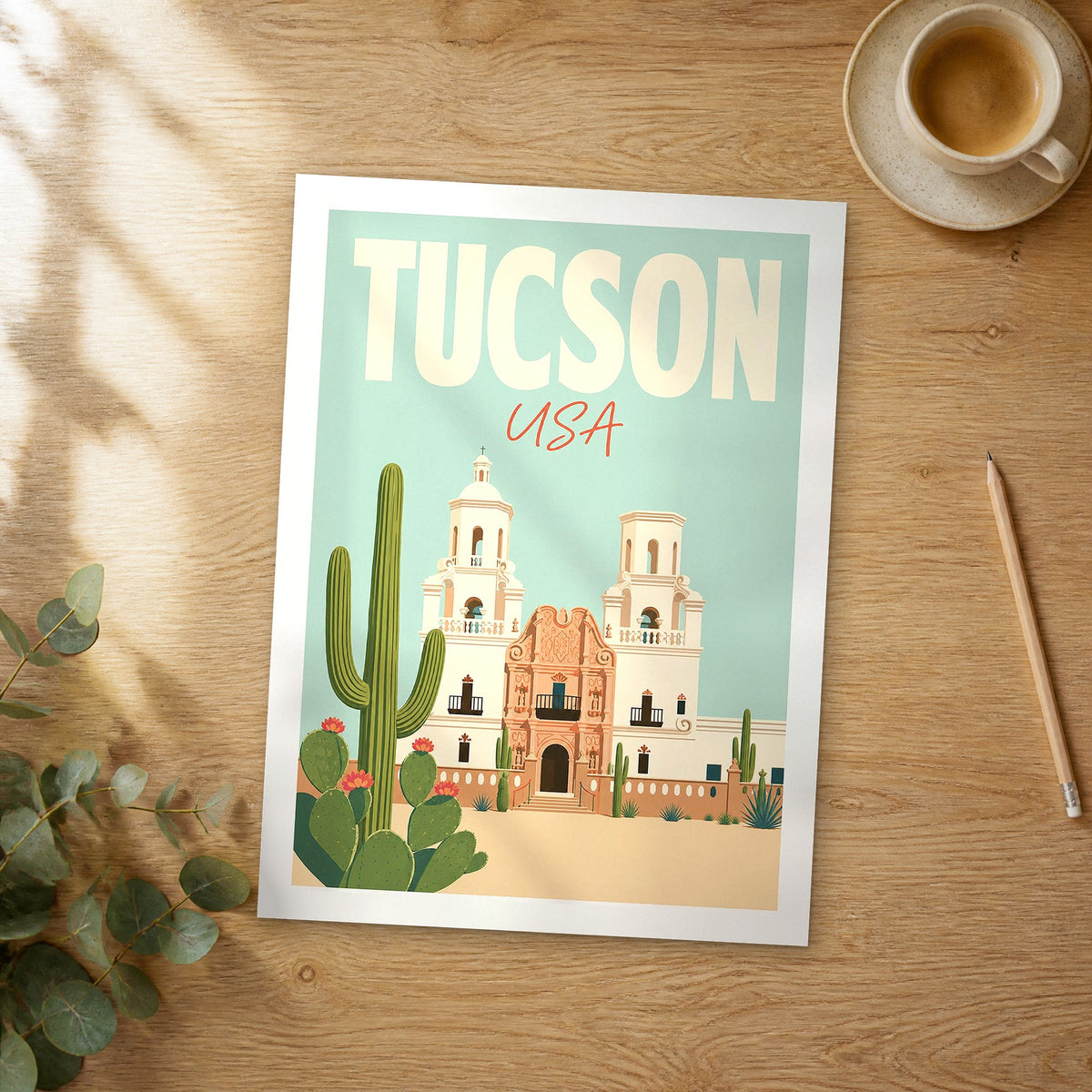 Unframed Tucson pastel pop art travel poster on a wooden table