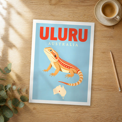 Unframed Uluru pop art travel poster on a wooden table